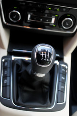 Top view of gear shift knob of manual transmission inside the car  