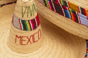 Fotobehang Traditional mexican sombrero straw hat close up © cienpies