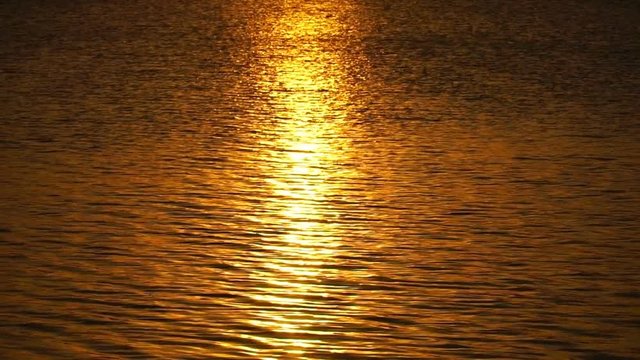 footage beautiful sunset reflected in water. 
