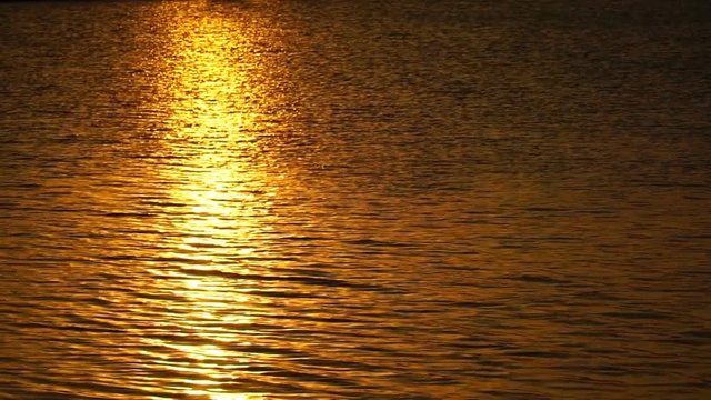 footage beautiful sunset reflected in water. 