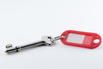 A Key and key fob without a label.