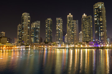Fototapeta na wymiar Dubai night city skyline with modern skycrapers, UAE