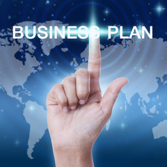 hand pressing business plan sign button. business concept