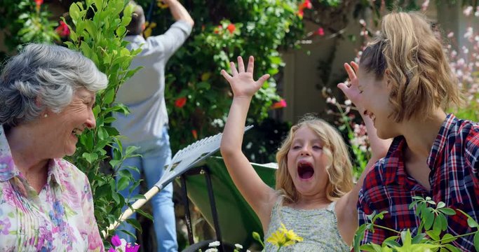 Mother and daughter gardening together