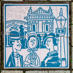 Signs along footpath at Yokohama Chinatown in Japan