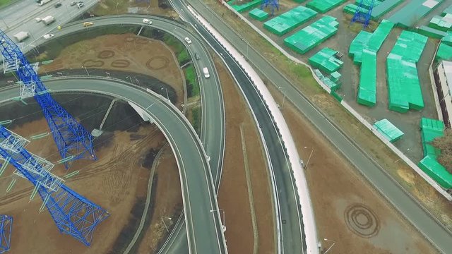 Aerial View of Highway Interchange in Moscow City, Russia. Day, Buildings, Power Line