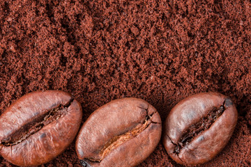 ground coffee beans background macro close up