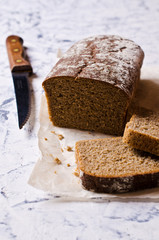 Cut loaf of rye bread