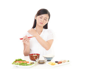 疲れた表情の女性