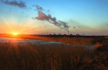  power plant  at sunset. pollution.