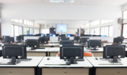 Defocused student study computer classroom for background.