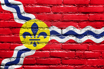 Flag of St. Louis, Missouri, painted on brick wall - obrazy, fototapety, plakaty