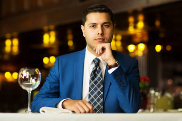 young successful businessman in the restaurant