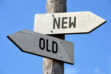 Old and new signpost