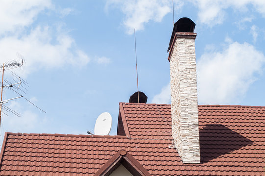 brick chimney on the roof