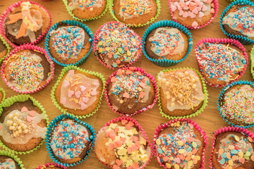 Delicious cup cakes / Tasty decorated cup cakes made by children ready to eat with lots of sugary toppings delicious