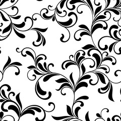Elegant seamless pattern. Tracery of swirls and leaves on a white background. Vintage style