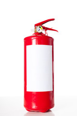 Obraz premium Red fire extinguisher isolated on white