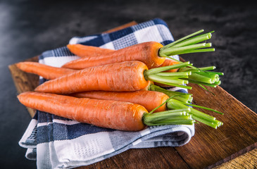 Carrot. Fresh Carrots bunch. Baby carrots. Raw fresh organic orange carrots. Healthy vegan...