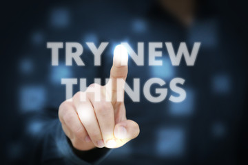 Businessman touching Try New Things