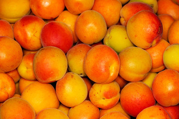 Baskets with fresh ripe apricots. Close up