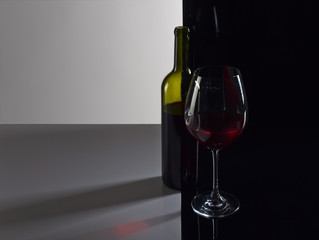  bottle and glass with red wine