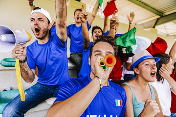 Fototapeta premium Supporters from Italy at stadium watching the match