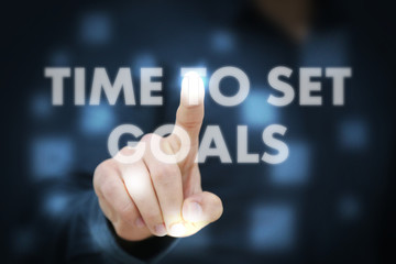 Businessman touching Time To Set Goals