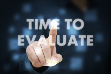 Businessman touching Time To Evaluate