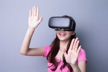 woman using VR headset glasses