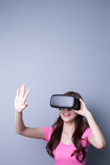 woman using VR headset glasses