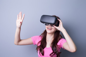 woman using VR headset glasses