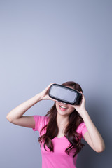 woman using VR headset glasses