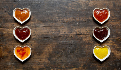 Assorted dips and sauces in a double banner