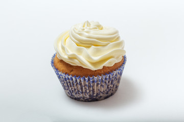 one yellow cupcakes with cream