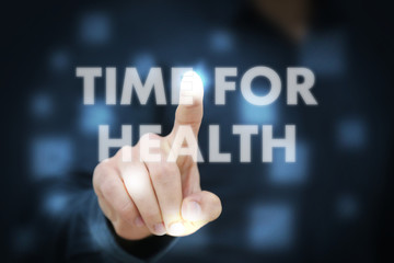 Businessman touching Time For Health