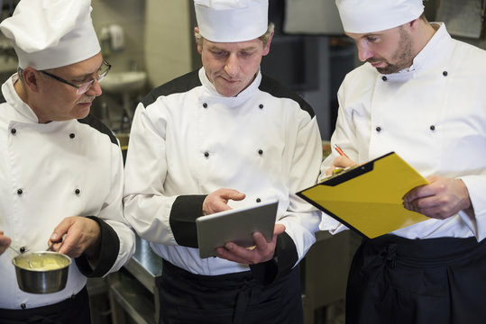 Consultation of chefs in the kitchen