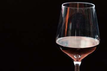 A Glass of Wine on a Black Background