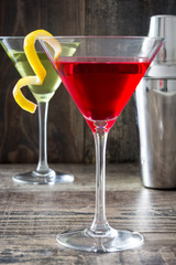 Cocktails and shaker on wood
