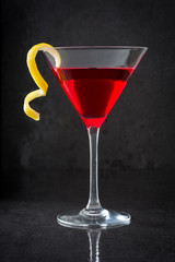Cosmopolitan cocktail on black background
