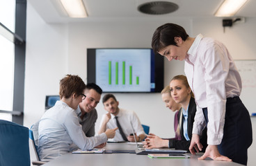 young  woman using  tablet on business meeting