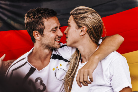 Supporters from Germany kissing at Stadium
