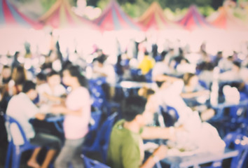Food Festival with Blurred People Background