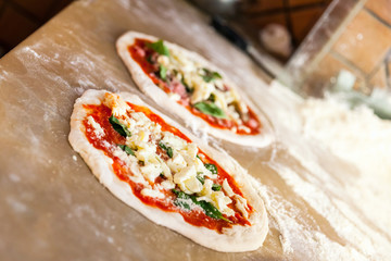 Preparing Pizza Margherita, two portions