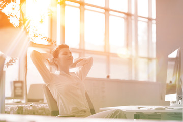 young business woman relaxing at workplace