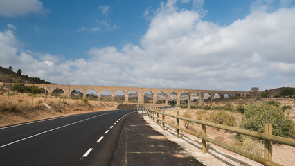 Fototapeta na wymiar asphalt road and serpentine bridge near Cartagena, Murcia region, Spain