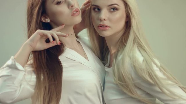 Two beautiful models at a joint photo shoot 