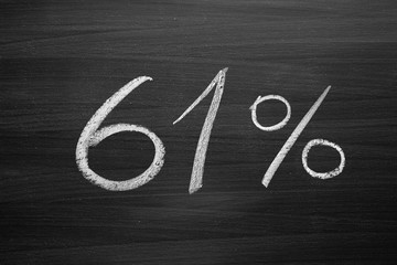 61 percent header written with a chalk on the blackboard
