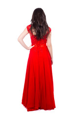 back view of young beautiful woman in red dress isolated on whit