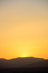 Idyllic scene of sunset in mountains